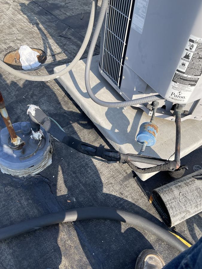 Rooftop AC unit refrigerant line set inspection