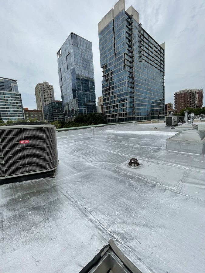 Finished rooftop coating with Chicago skyline view